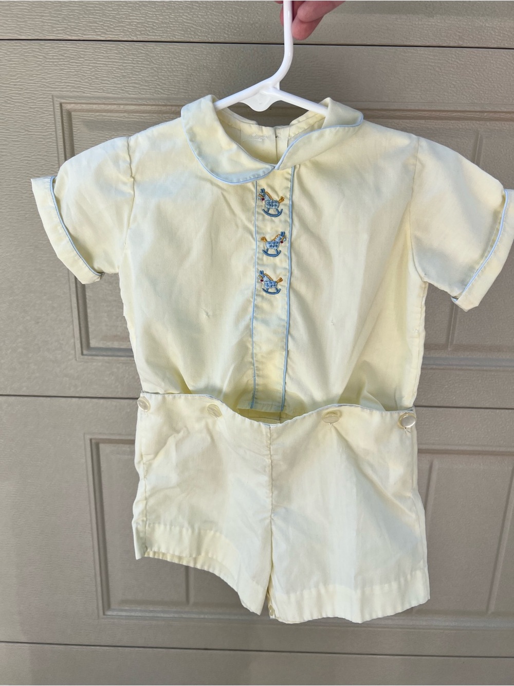 Vintage Baby Short Romper in Pale Yellow with Blue Trim embroidered rocking hors